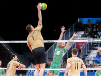 Nikolay NIKOLOV (18) of bulgaria are jumping on the net on the hit of Christian FROMM(1) of Germany  in the match Germany -Bulgaria during t...