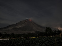 KARO, INDONESIA - JUNE 29: Hot lava run downing from as Mount Sinabung on June 29, 2015 in Karo, Indonesia. Over 10,000 residents living nea...