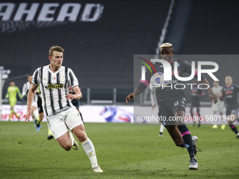 Napoli forward Victor Osimhen (9) fights for the ball against Juventus defender Matthijs de Ligt (4) during the Serie A football match n.3 J...