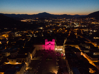 An aerial view of  Duomo of L'Aquila is lit up in pink. Giro d'Italia Trophy 