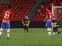 Harry Maguire, of Manchester United, on his knees during the UEFA Europa League Quarter Final leg one match between Granada CF and Mancheste...