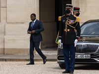 Togo's President Faure Essozimna Gnassingbe visiting the Elysee Palace for a working lunch with French President Emmanuel Macron, in Paris,...