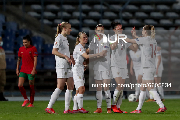 Russias team players celebrate the victory at the end of the UEFA Women's EURO 2022 play-off first leg match between Portugal and Russia, at...