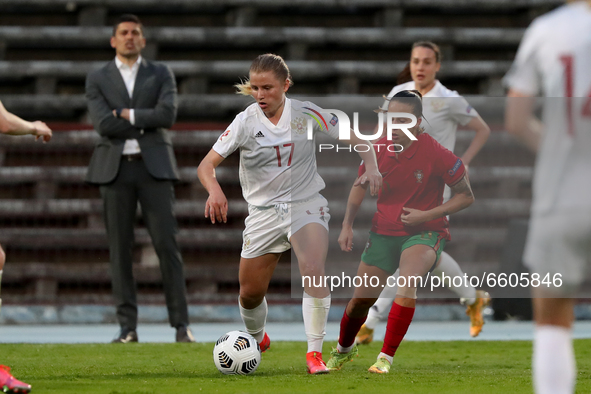 Marina Fedorova  of Russia (L) vies with Tatiana Pinto of Portugal during the UEFA Women's EURO 2022 play-off first leg match between Portug...