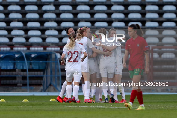 Nelli Korovkina of Russia celebrates with teammates after scoring during the UEFA Women's EURO 2022 play-off first leg match between Portuga...
