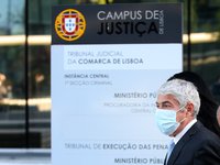 Portugal's former Prime Minister Jose Socrates wearing a face mask leaves the court after the instructional decision session of the high-pro...