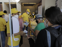 Workers at the Swedish IKEA store in Mexico, on April 9, 2021  located in the east of Mexico City, receive visitors to take their temperatur...