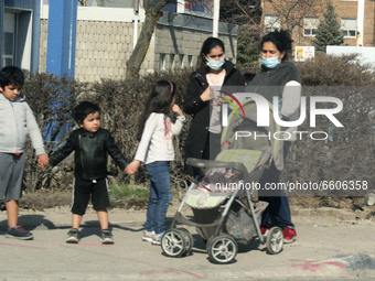 People wearing face masks to protect them from the novel coronavirus (COVID-19) in Markham, Ontario, Canada on April 09, 2021. Ontario is re...