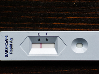 View of a negative test result for Coronavirus, during the realization of a Corona rapid self-test that from today people can purchase in se...