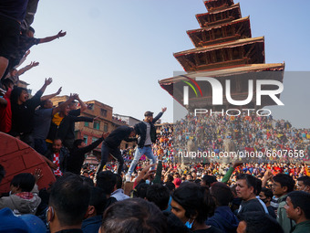 Devotees pull a chariot carrying an idol of Hindu god Bhairav during the Bisket Jatra festival held to mark the Nepalese New Year in Bhaktap...