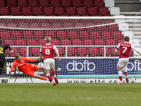 Sam Hoskins scores from the penalty spot for Northampton Town, and equalises to bring the score level at 1 - 1 against Bristol Rovers, durin...