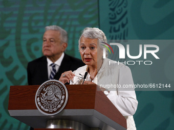 Mexico’s President Lopez Obrador seen behind  of Secretary of the Interior, Olga Sanchez Cordero  while gesticulates when talking   during a...