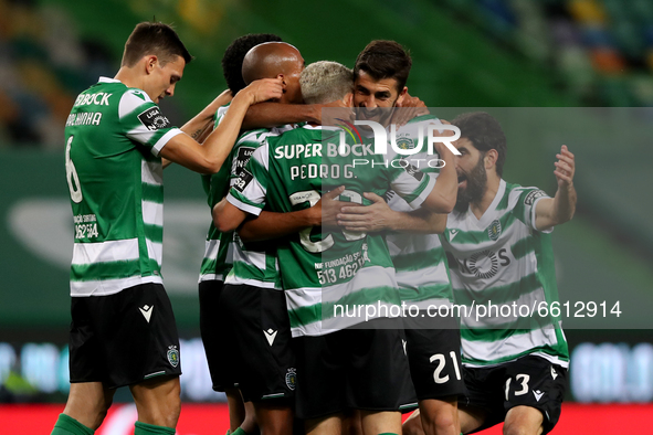 Pedro Goncalves of Sporting CP celebrates with teammates after scoring during the Portuguese League football match between Sporting CP and F...