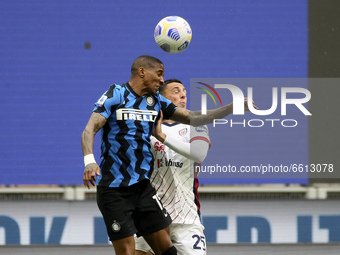Ashley Young (L) of FC Internazionale competes for the ball with Gabriele Zappa (R) of Cagliari Calcio during the Serie A match between FC I...
