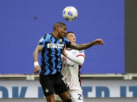 Ashley Young (L) of FC Internazionale competes for the ball with Gabriele Zappa (R) of Cagliari Calcio during the Serie A match between FC I...