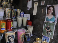 Candles and photographs at the memorial dedicated to the deceased and sick people of COVID-19 in Mexico, located in the Plaza Juan Pablo II...