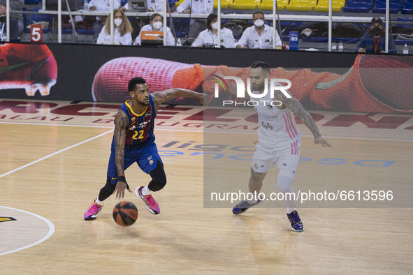 Cory Higgins (22) of Barça and Jeffery Taylor (44) of Real Madrid during the Barça vs Real Madrid match of ACB league on April 11, 2021, in...