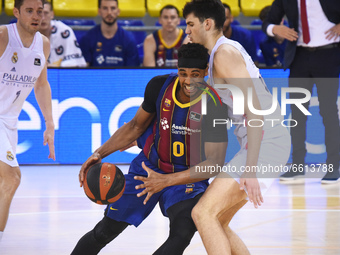 Cory Higgins and Tristan Vukcevic during the match between FC Barcelona and Real Madrid, corresponding to the week 30 of the Liga Endesa, pl...