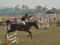 Nepalese Army Horse Cavalry perform horse riding skills during Ghode Jatra or the 'Festival of Horse' celebrated at the Army Pavilion, Kathm...