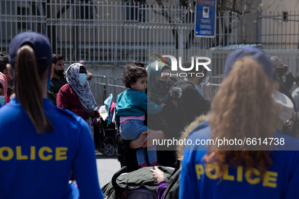 Refugees and migrants protest at the Asylum service in Athens, Greece demanding asylum and papers on April 12, 2021. 