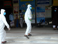A group of health worker is seen in front of Dhaka Medical College Hospital for treatment in Dhaka, Bangladesh, on April 12, 2021.

 (