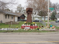 Flowers, candles, and signs lie at a makeshift memorial for Daunte Wright in Brooklyn Center, Minnesota, USA on April 13, 2021. (