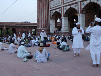 Muslims pray before breaking their fast (iftar) during the holy month of Ramadan, amidst the spread of the coronavirus disease (Covid-19), a...