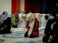 People play in the Mosque, in Bogota, Colombia, on April 15, 2021 during the Ramadan.  (