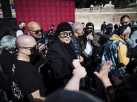 Singer Renato Zero takes part in a flash mob performance called by the 'Bauli in Piazza' movement against the lack of aid to the cultural, e...