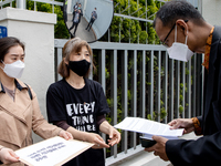 Kang In-nam(center), a representative of the Overseas Residents' Movement Solidarity, delivers an open letter to Indonesia political council...