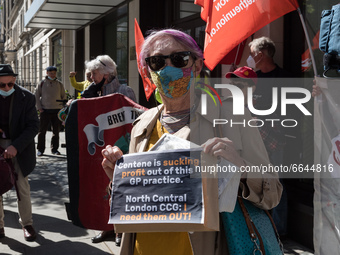LONDON, UNITED KINGDOM - APRIL 22, 2021: Doctors, members of the trade unions and health campaigners stage a protest against GP practices be...