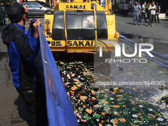 The government of the East Jakarta region destroyed alcoholic beverages, with various brands on the grounds of the Pulogadung Sector Police...