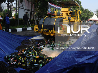 The government of the East Jakarta region destroyed alcoholic beverages, with various brands on the grounds of the Pulogadung Sector Police...