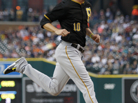 Pittsburgh Pirates' Jordy Mercer scores a run in the second inning of a baseball game against the Detroit Tigers in Detroit, Michigan USA, o...