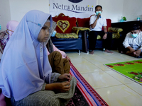 Some blind people at the Netra Mandiri Foundation, Palembang, Indonesia, on April 24, 2021 listening to Islamic studies.  (