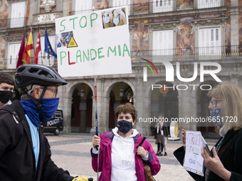 Denialist covid-19 during a demonstration in the Plaza Mayor of Madrid, Spain, on April 24, 2021 against the restriction measures of the gov...