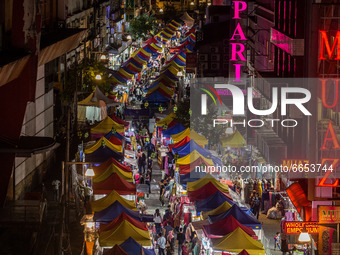 Rows of bazaar stalls line a street during the holy month of Ramadan in Kuala Lumpur, on April 25, 2021. During the holy month of Ramadan, a...