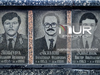 Tombstones of three workers of the Chernobyl Nuclear Plant dead by the aftermath of the accident in 1986 in a memorial site in Slavutych, Uk...