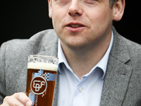 Scottish Conservative Leader Douglas Ross drinks a pint during a visit to a pub on April 26, 2021 in Edinburgh, Scotland. This visit come’s...