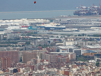 Helicopter flying over Barcelona due to a fire near the city, on 26th April 2021. 
 -- (