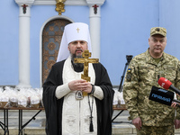 Metropolitan Epifaniy, head of the Orthodox Church of Ukraine, during sanctify Ukrainian traditional Easter breads  paskas in front of the S...
