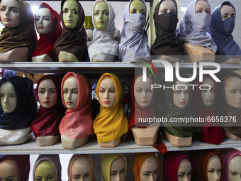 Mannequins headscarves at a hijab shop in Bogor, Indonesia, on April 26, 2021, during the Muslim holy fasting month of Ramadan. (