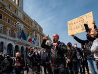 A gentleman from the wedding category, protests on the Lungomare in front of the Puglia Region on the first day in the orange area for lack...