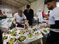 young volunteers work to break the fast of the needy during the month of Ramadan, in Algiers, Algeria on April 26, 2021, Muslims around the...