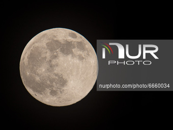 The Pink Supermoon of April 2021 as seen from the Dutch city, Eindhoven, The Netherlands on April 26, 2021. The super full moon is bigger an...