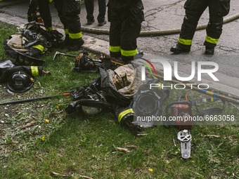 Firefighter's discarded gear after returning from battling from the Historic House In Palmer Square, Chicago, USA, on April 27, 2021. A hous...