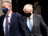 British Prime Minister Boris Johnson leaves 10 Downing Street for his weekly Prime Minister's Questions (PMQs) appearance in the House of Co...