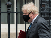 LONDON, UNITED KINGDOM - APRIL 28, 2021: British Prime Minister Boris Johnson leaves 10 Downing Street for PMQs at the House of Commons, on...