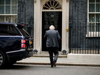 British Prime Minister Boris Johnson returns to 10 Downing Street from his weekly Prime Minister's Questions (PMQs) appearance in the House...