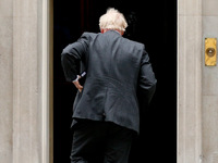 British Prime Minister Boris Johnson returns to 10 Downing Street from his weekly Prime Minister's Questions (PMQs) appearance in the House...